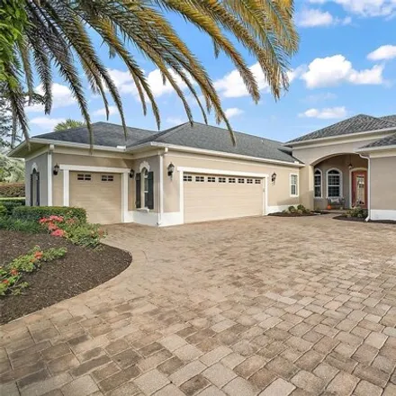 Buy this 4 bed house on 38852 Harborwoods Place in Lady Lake, FL 32158