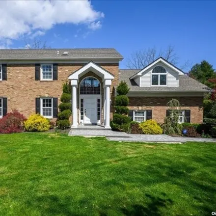 Buy this 4 bed house on 124 Burrs Lane in Dix Hills, NY 11746