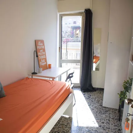 Rent this 8 bed room on Via Ludovico Ariosto 11 in 09128 Cagliari Casteddu/Cagliari, Italy