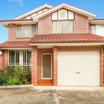 Rent this 3 bed townhouse on Green Valley Road in Green Valley NSW 2168, Australia