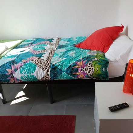 Rent this 4 bed room on Madrid in Calle Ernestina Manuel de Villena, 4