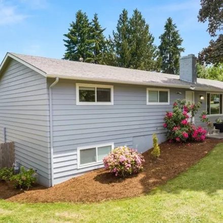 Buy this 4 bed house on 14130 Southwest 100th Avenue in Tigard, OR 97224