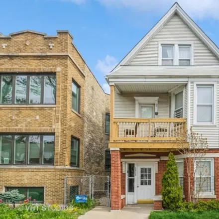 Buy this 6 bed house on 2414 West Cullom Avenue in Chicago, IL 60618