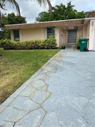 Buy this 3 bed house on 7105 Northwest 68th Street in Tamarac, FL 33321