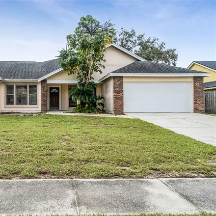 Buy this 3 bed house on 8003 Village Green Road in Orange County, FL 32818