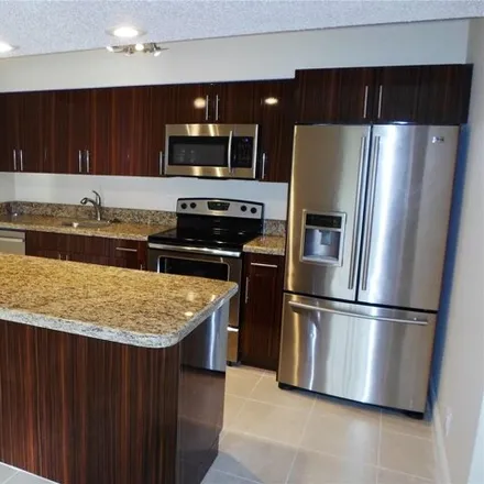 Rent this 1 bed condo on Cypress Course in Cypress Grove Lane, Pompano Beach