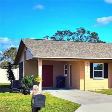 Rent this 2 bed house on 1966 Forked Creek Drive in Englewood, FL 34223