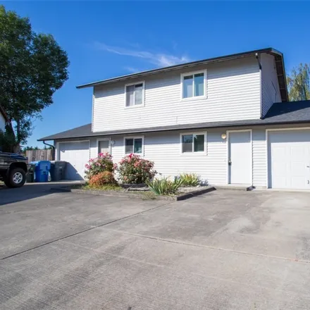 Buy this 4 bed duplex on 679 13th Street Northwest in Puyallup, WA 98371