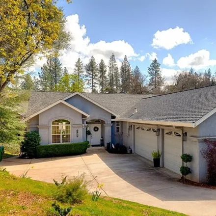 Buy this 4 bed house on Lake of the Pines Golf Course in Lakeshore South, Lake of the Pines
