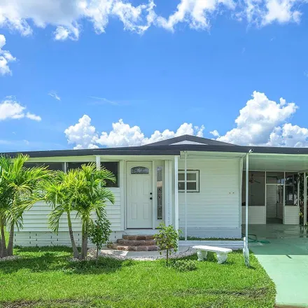 Buy this 2 bed house on 241 Tangerine Drive in Orange Harbor Mobile Home Park, Lee County