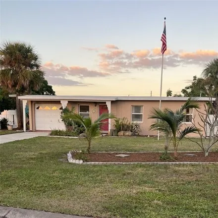 Buy this 3 bed house on 201 Waterway Cir NE in Port Charlotte, Florida