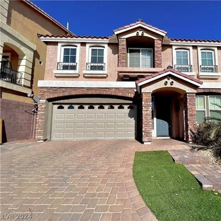 Rent this 4 bed house on 6396 Cascade Cliffs Ct in Las Vegas, Nevada