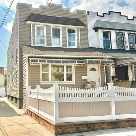 Buy this 8 bed house on 90-54 185th Street in New York, NY 11423