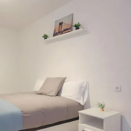 Rent this 5 bed room on Calle de Ramón Luján in 28026 Madrid, Spain