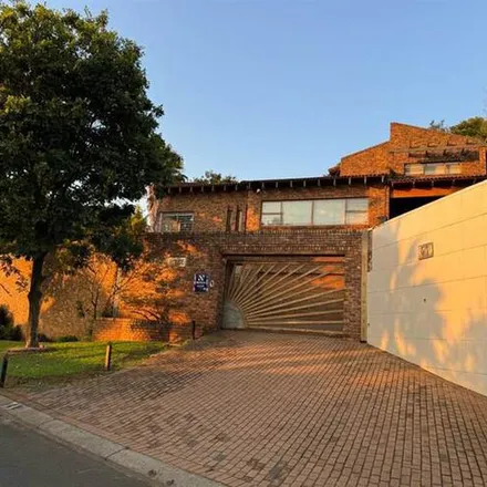 Rent this 4 bed apartment on Comaro Street in Bassonia, Johannesburg