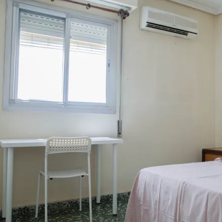 Rent this 6 bed room on Carrer del Ministre Lluís Mayans in 46019 Valencia, Spain