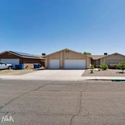 Buy this 4 bed house on 11271 East 27th Place in Fortuna Foothills, AZ 85367