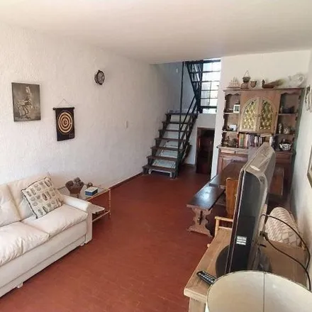 Buy this 4 bed house on Calle 309 Bis in Partido de Villa Gesell, Villa Gesell
