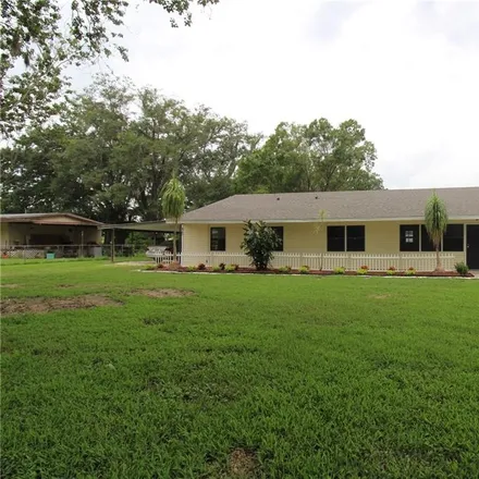 Buy this 4 bed house on 2306 Dawn Heights Drive in Polk County, FL 33801