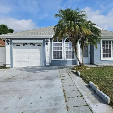 Rent this 4 bed house on 7358 Hollow Ridge Circle in Orange County, FL 32822