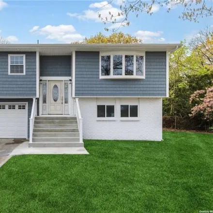 Buy this 4 bed house on 140 East Woodside Avenue in Brookhaven, East Patchogue