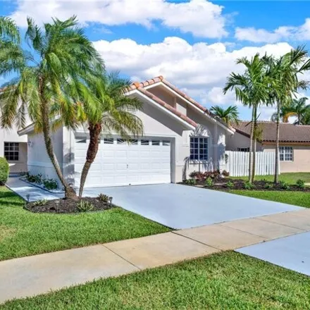 Rent this 4 bed house on 555 177th Way in Pembroke Pines, FL 33029