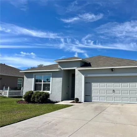 Buy this 4 bed house on 881 Basil Court in Polk County, FL 34759