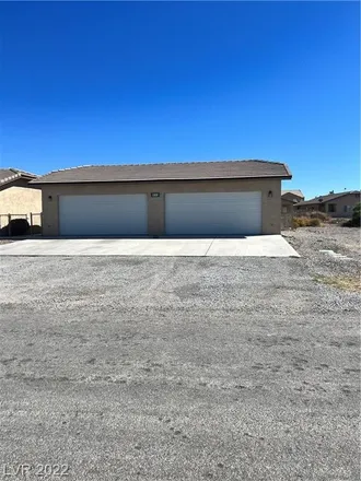 Rent this 2 bed duplex on 1411 Ogallala Street in Pahrump, NV 89048