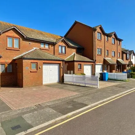 Buy this 3 bed townhouse on Labrador Drive in Poole, BH15 1UY