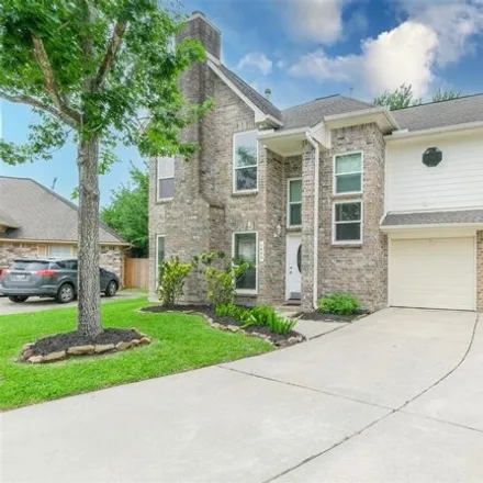 Rent this 4 bed house on 1447 Quiet Green Court in Houston, TX 77062