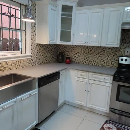Rent this 3 bed townhouse on Sandhurst Crescent in Barbican, Jamaica