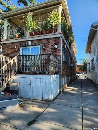 Image 3 - 122-18 Lax Avenue, New York, NY 11356, USA - House for sale