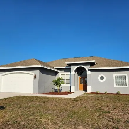 Rent this 3 bed house on 877 Southwest Squirrel Avenue in Port Saint Lucie, FL 34953