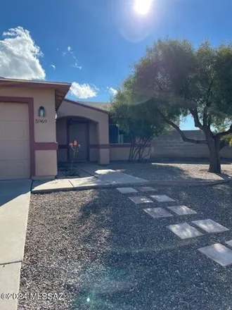 Rent this 3 bed house on 5999 South Pin Oak Drive in Tucson, AZ 85746