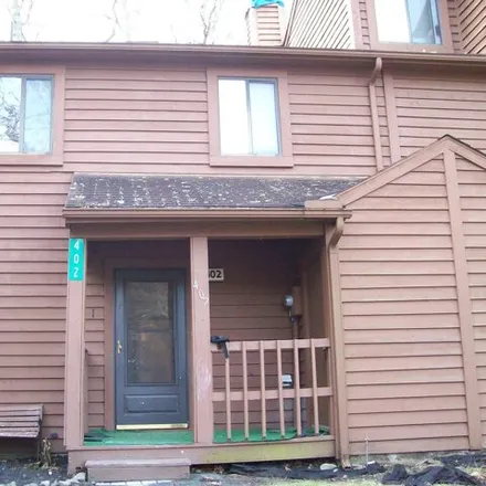 Rent this 2 bed townhouse on 470 Tudor Court in Saw Creek, Lehman Township