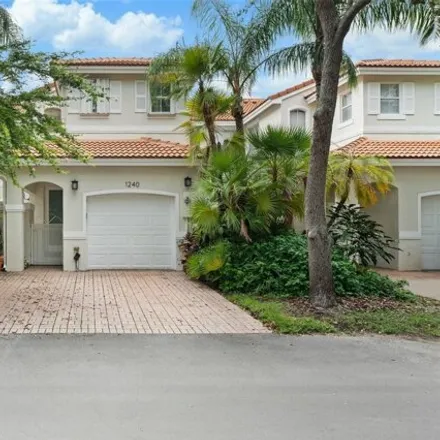 Rent this 3 bed townhouse on 1240 Weeping Willow Way Unit 1240 in Hollywood, Florida