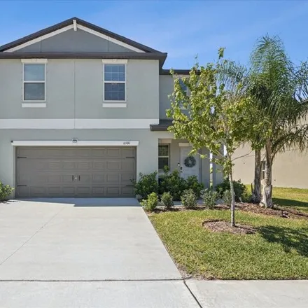 Buy this 4 bed house on Apple Snail Avenue in Elfers, FL 34690