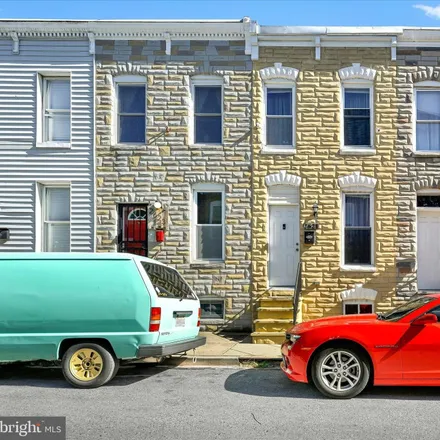 Buy this 2 bed townhouse on 2621 Miles Avenue in Baltimore, MD 21211