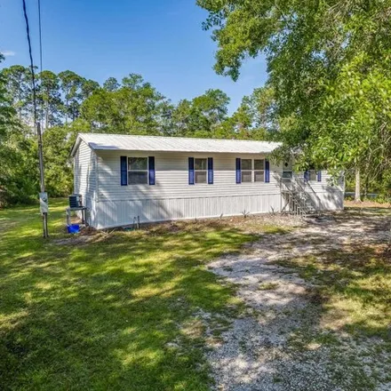 Buy this studio apartment on Taylor Street in Panacea, Wakulla County