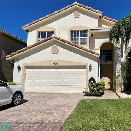 Rent this 4 bed house on 7760 Colony Lake Drive in Palm Beach County, FL 33436