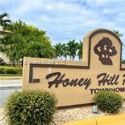 Buy this 3 bed townhouse on 19754 Northwest 34th Avenue in Riviera Mobile Park, Miami Gardens