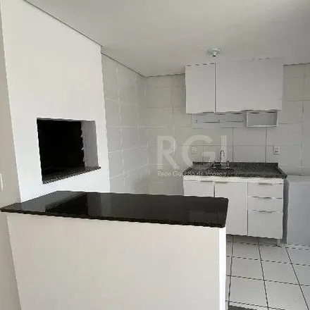 Rent this 3 bed apartment on Rua Umbu in Passo da Areia, Porto Alegre - RS