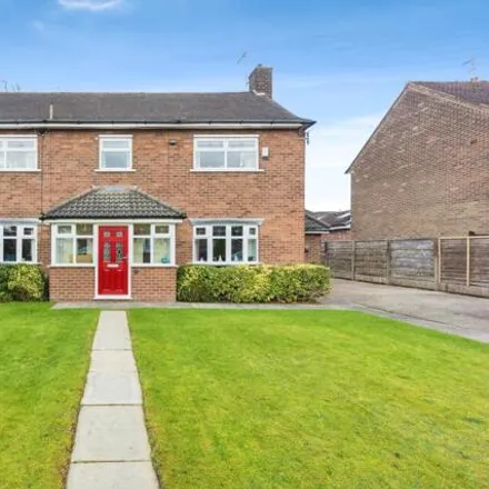 Buy this 4 bed house on Fawborough Road in Manchester, M23 9BU
