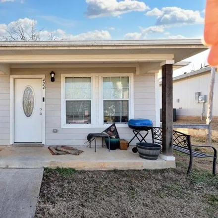 Rent this 3 bed house on 466 Munson Street in Denison, TX 75021