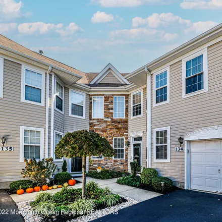 Buy this 4 bed townhouse on Shinnecock Drive in Manalapan Township, NJ 07726