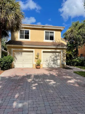 Rent this 3 bed loft on 4447 Onega Circle in West Palm Beach, FL 33409