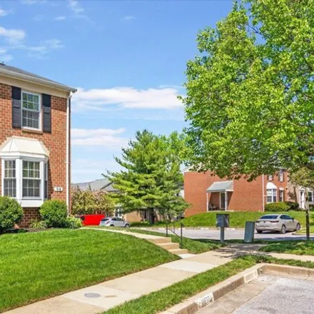 Rent this 4 bed townhouse on 98 Courtland Woods Circle in Pikesville, MD 21208