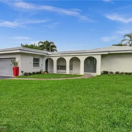 Rent this 3 bed house on 5981 Northeast 22nd Way in Imperial Point, Fort Lauderdale