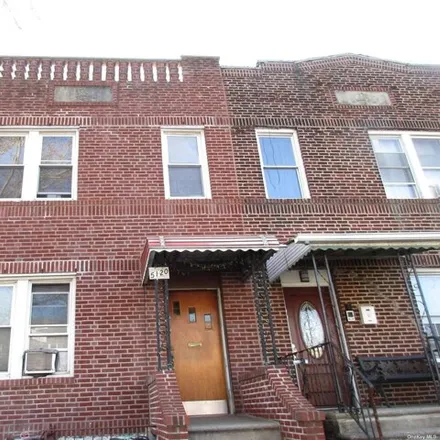 Buy this 5 bed house on 51-20 48th Street in New York, NY 11377