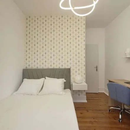 Rent this 8 bed apartment on Rua da Ilha do Pico 20 in 1000-169 Lisbon, Portugal